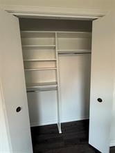 7 Yale Circle Richardson, TX 75081 - Photo 12 of 19 a view of walk in closet with empty racks