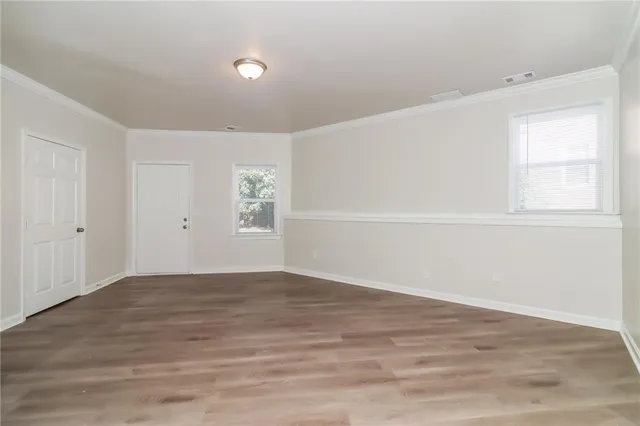 a view of a room with a hanging light