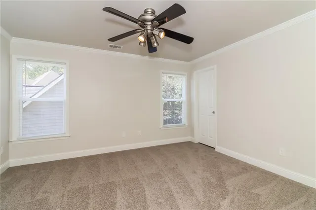 a bathroom with a tub a sink and mirror