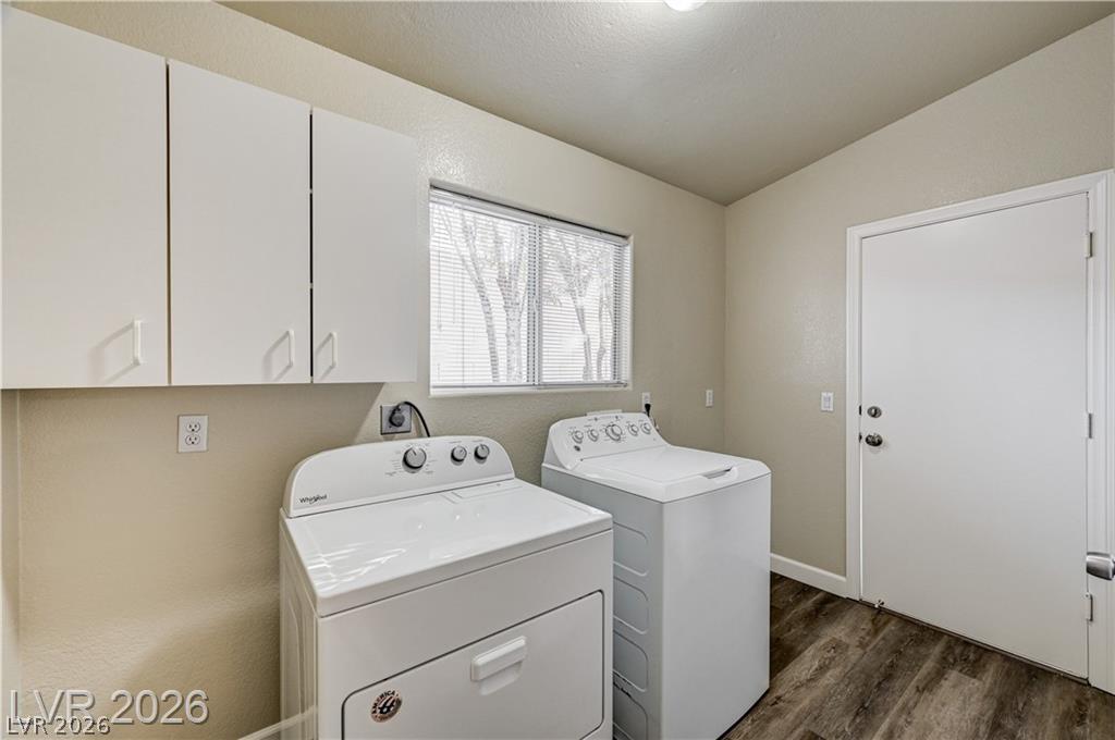 2283 Ramsgate Drive Henderson, NV 89074 - Photo 19 of 51 A functional laundry space highlights convenient cabinetry and durable plank flooring.