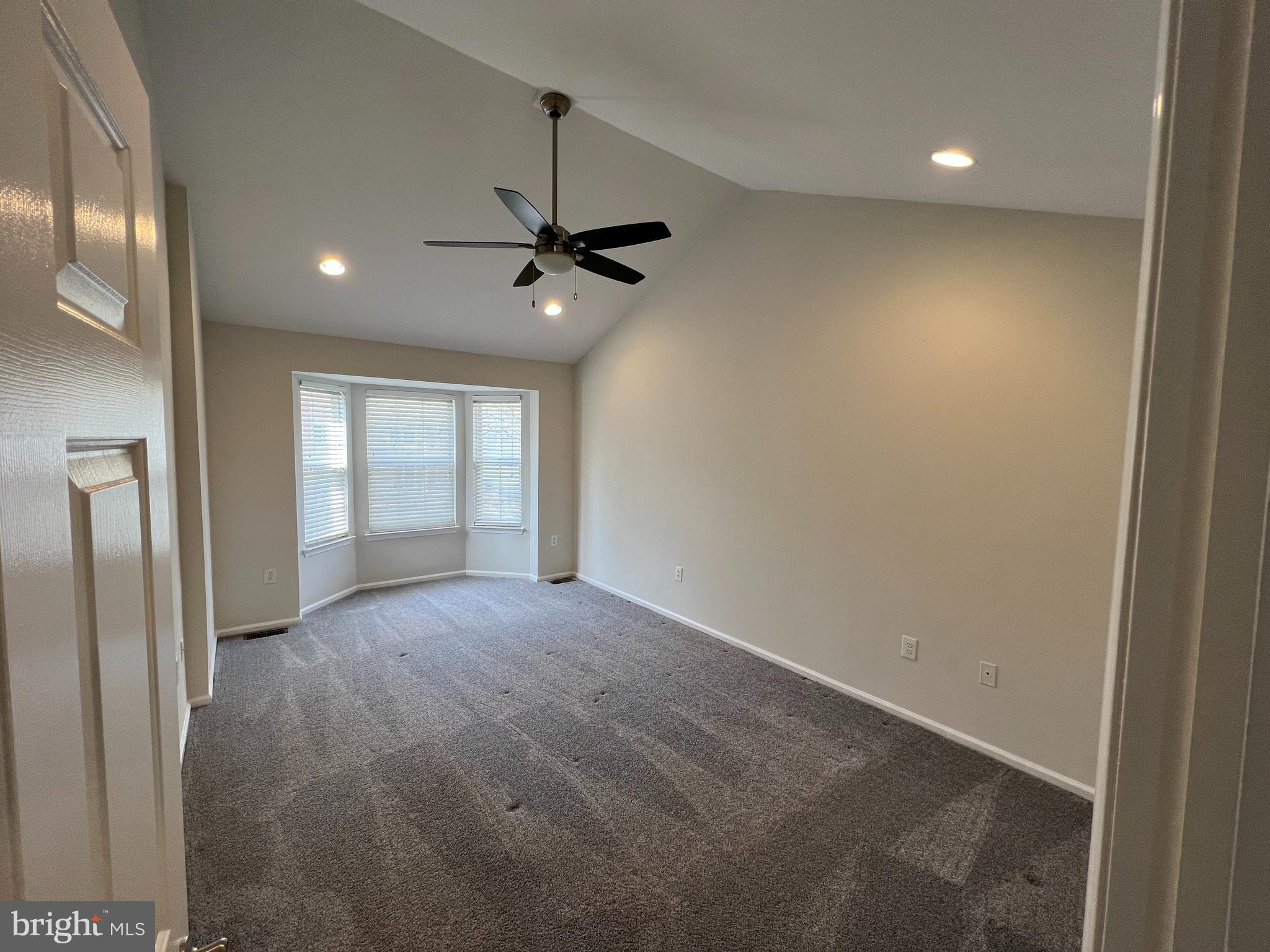 10 Howe Court Pennington, NJ 08534 - Photo 14 of 39 an empty room with windows and fan