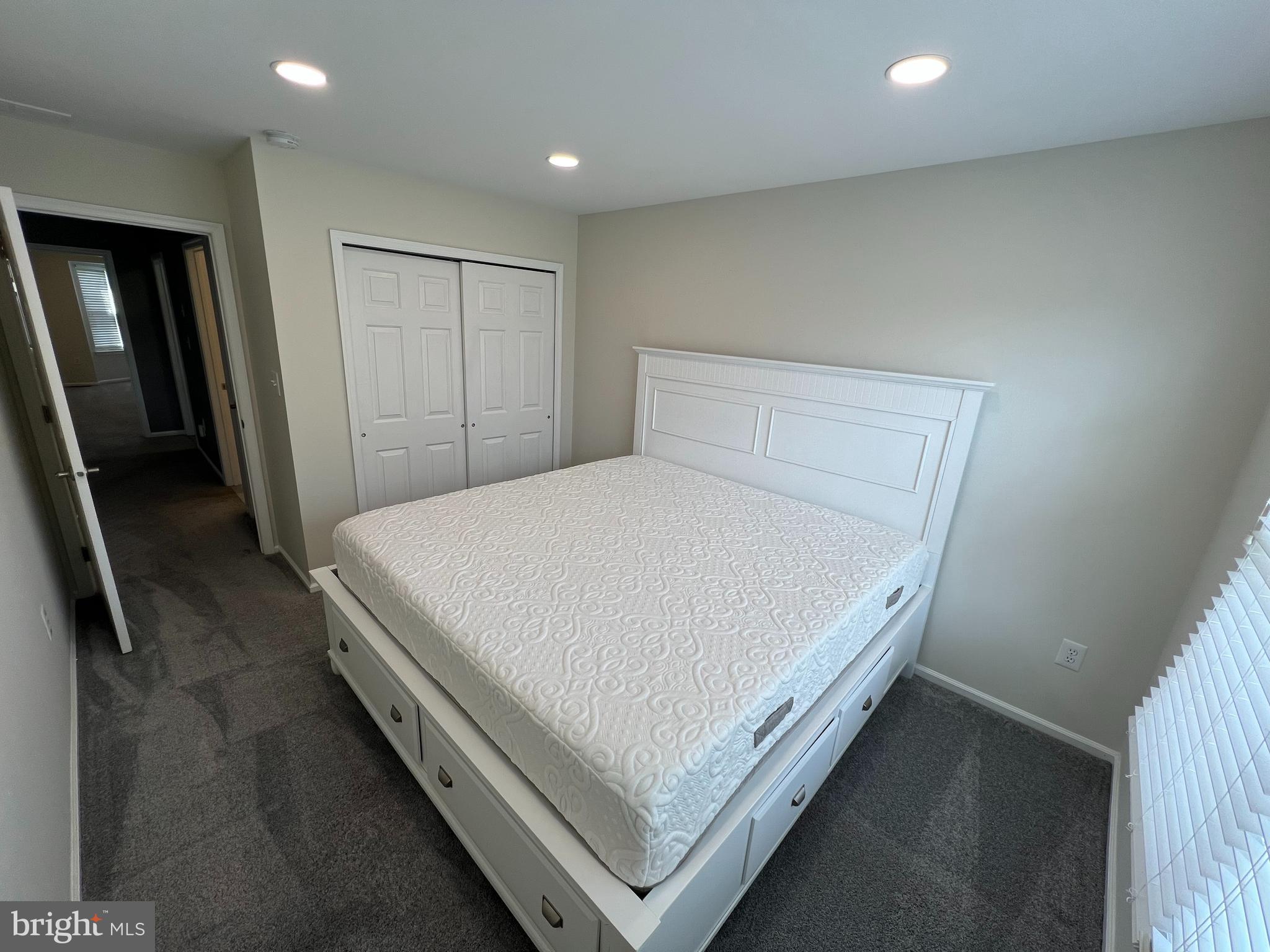 10 Howe Court Pennington, NJ 08534 - Photo 16 of 39 a bed sitting in a room next to a window