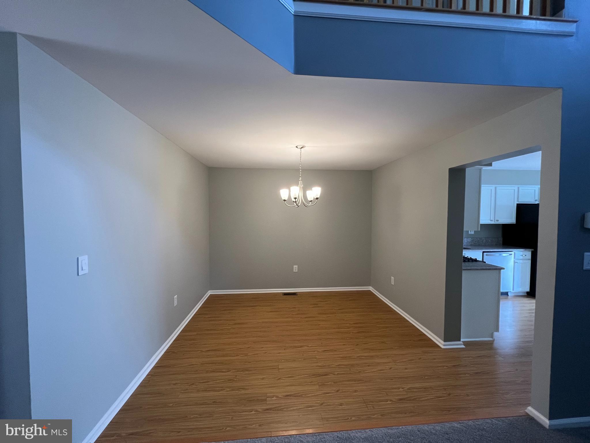 10 Howe Court Pennington, NJ 08534 - Photo 23 of 39 a view of a room with wooden floor and a hallway