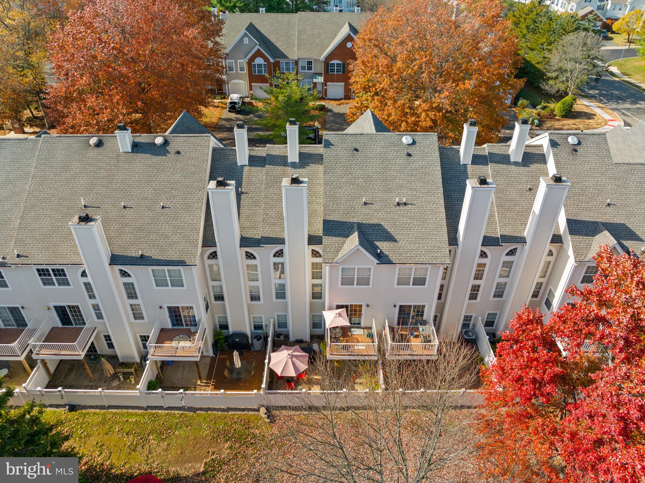 10 Howe Court Pennington, NJ 08534 - Photo 26 of 39 an aerial view of residential houses with outdoor space and parking