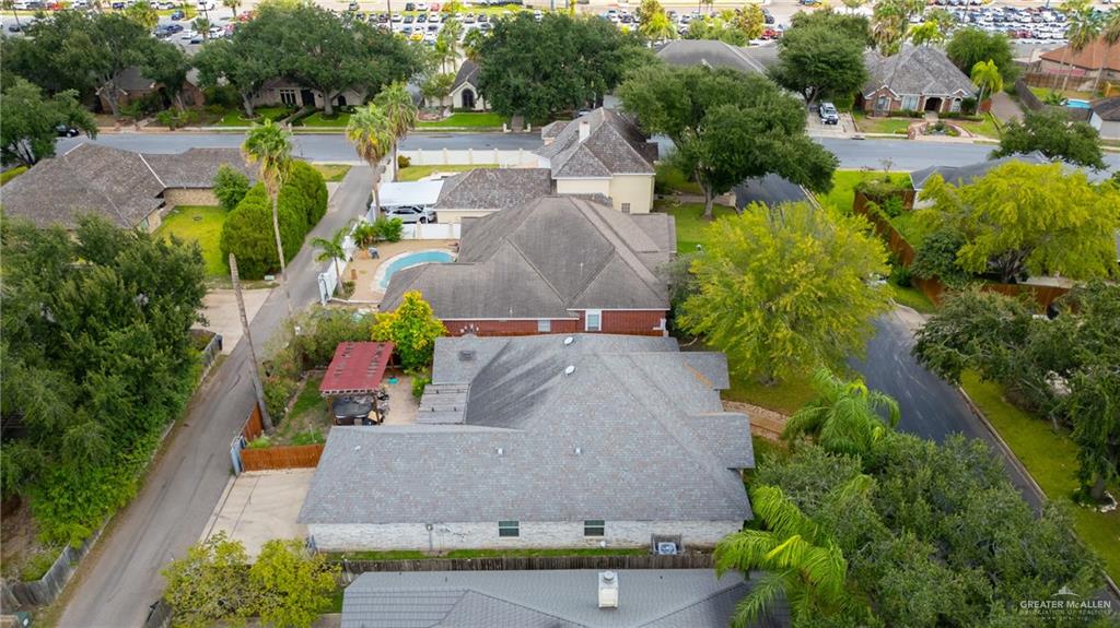 105 East Hawk Avenue McAllen, TX 78504 - Photo 27 of 34 an aerial view of a house with a garden and lake view