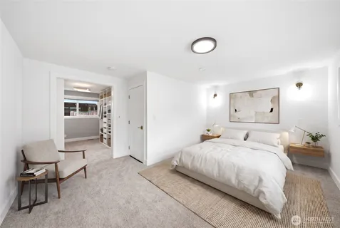 a bedroom with a bed and furniture