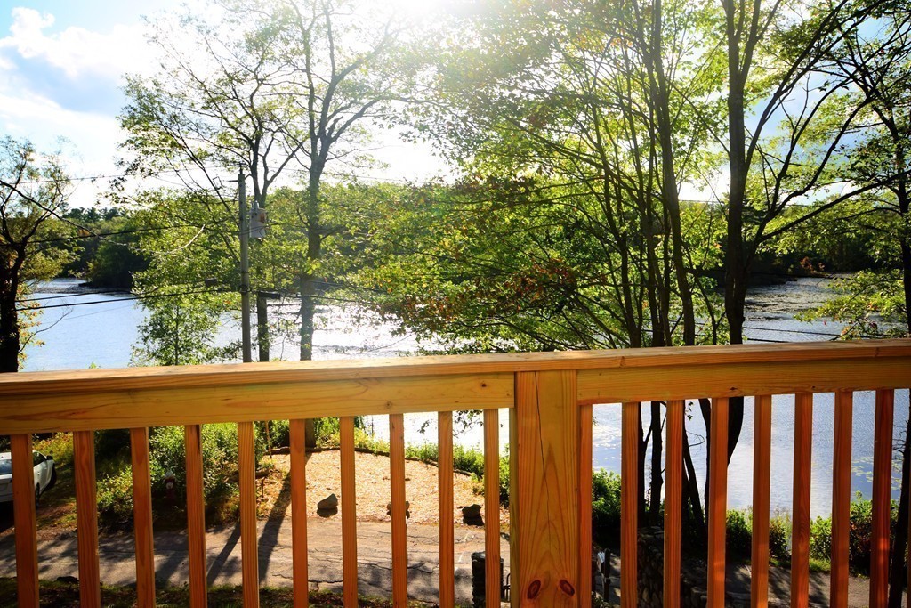 89 Lakeview Avenue Bellingham, MA 02019 - Photo 11 of 30 a view of a wooden fence