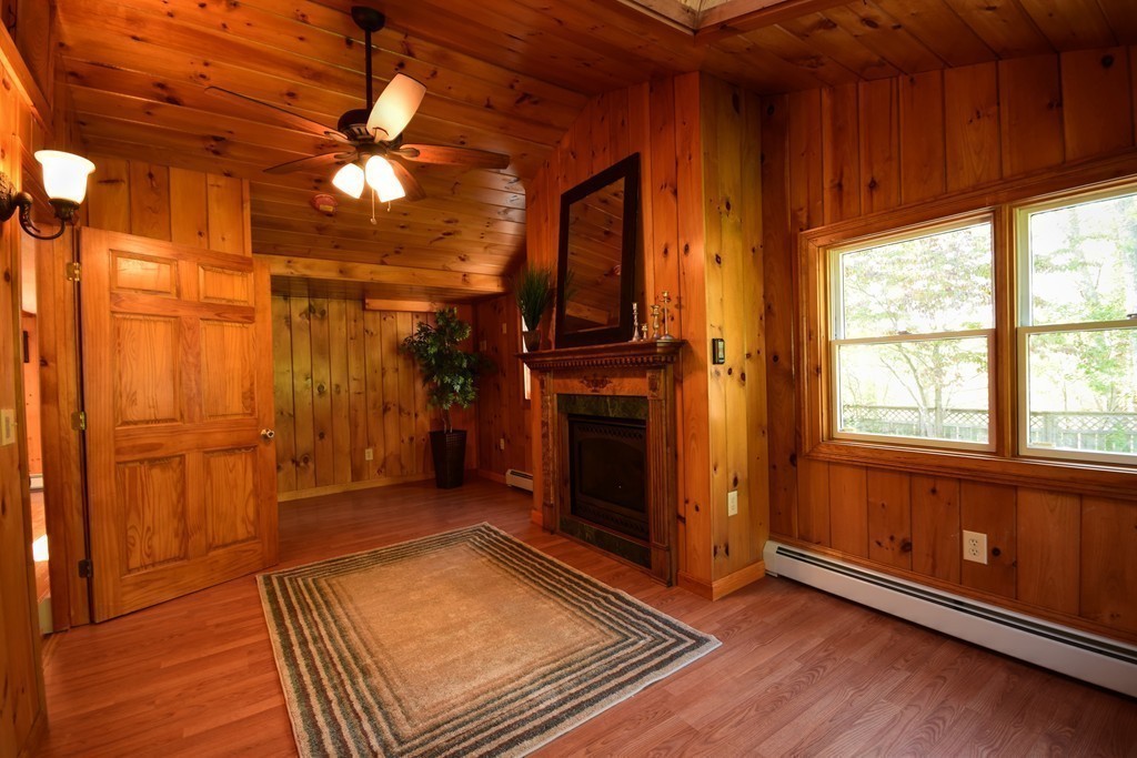89 Lakeview Avenue Bellingham, MA 02019 - Photo 15 of 30 a view of empty room with wooden floor and fan