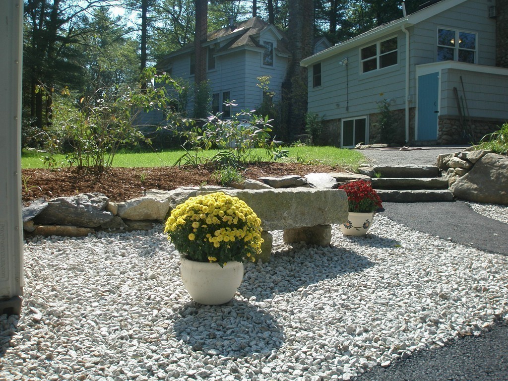 89 Lakeview Avenue Bellingham, MA 02019 - Photo 4 of 30 a view of a backyard with sitting area