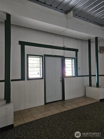 a view of an empty room and window