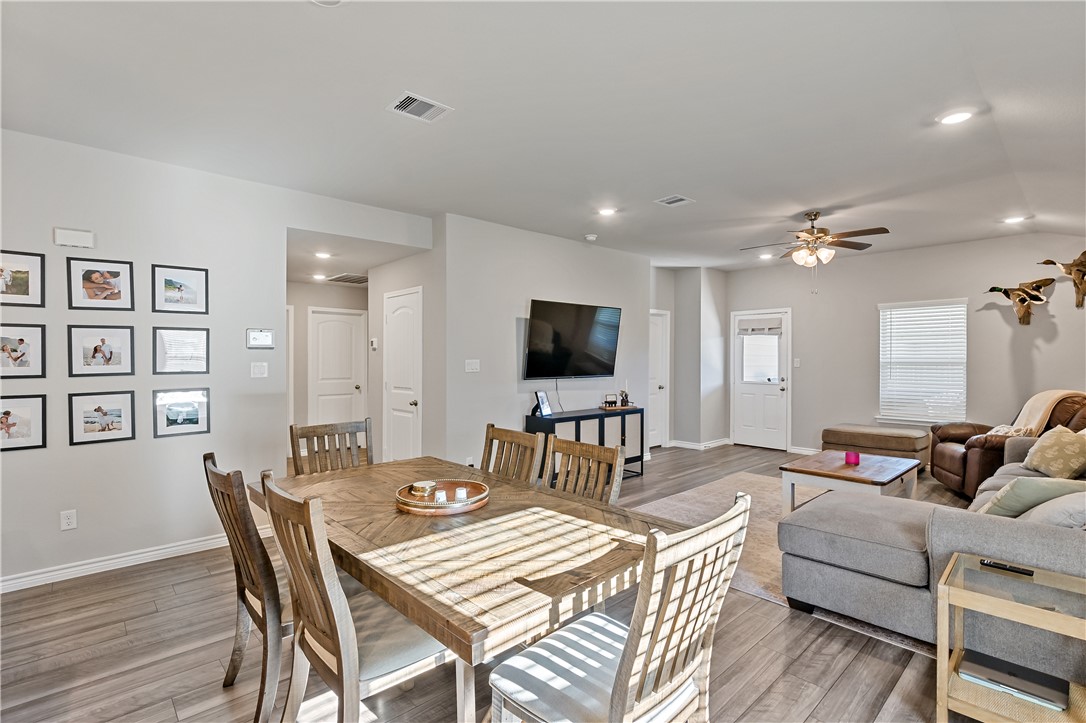 2135 Chief Street Bryan, TX 77807 - Photo 11 of 26 a living room with furniture and a flat screen tv