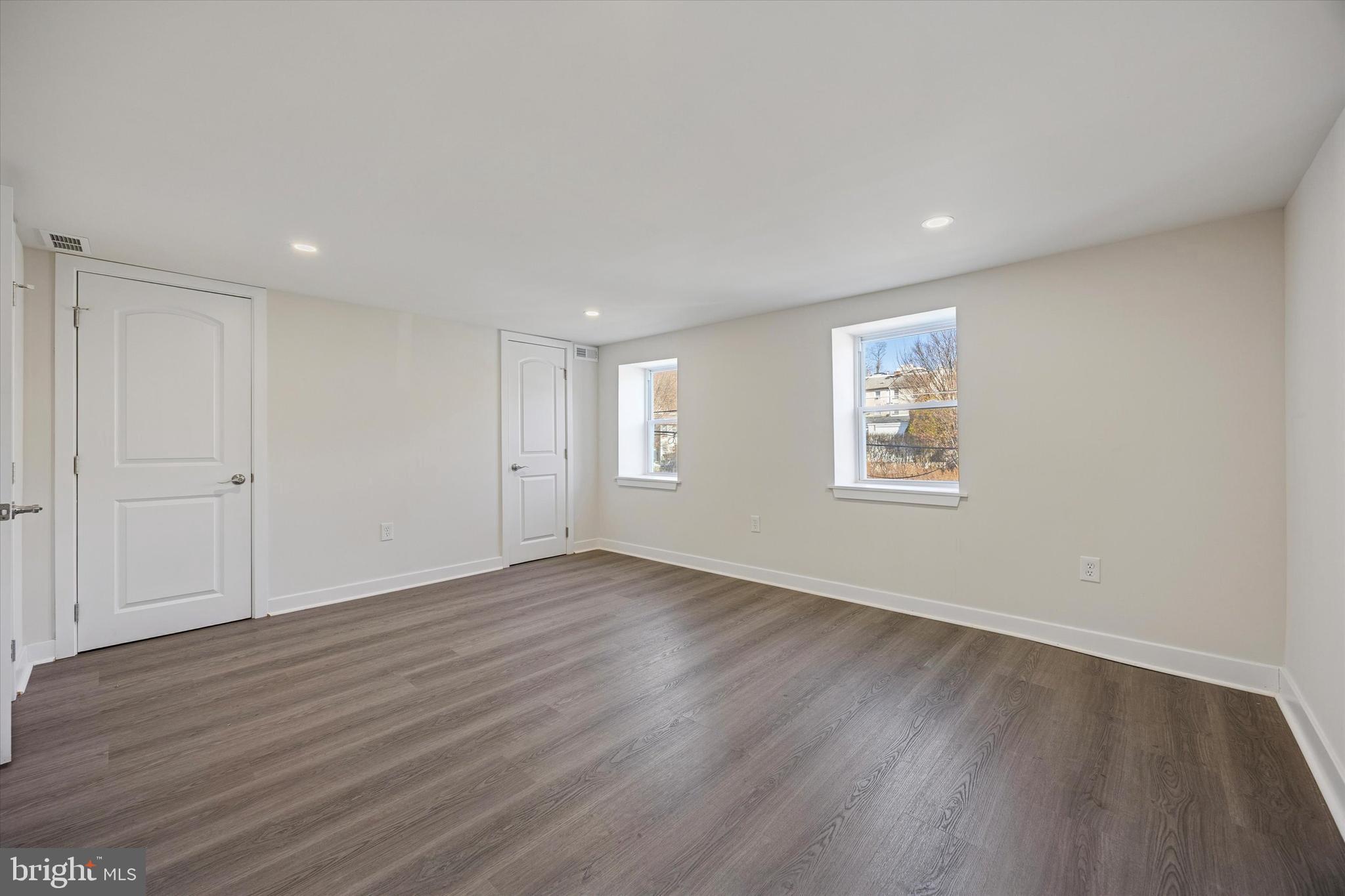 4666 Canton Street Philadelphia, PA 19127 - Photo 15 of 35 a view of an empty room with wooden floor and a window