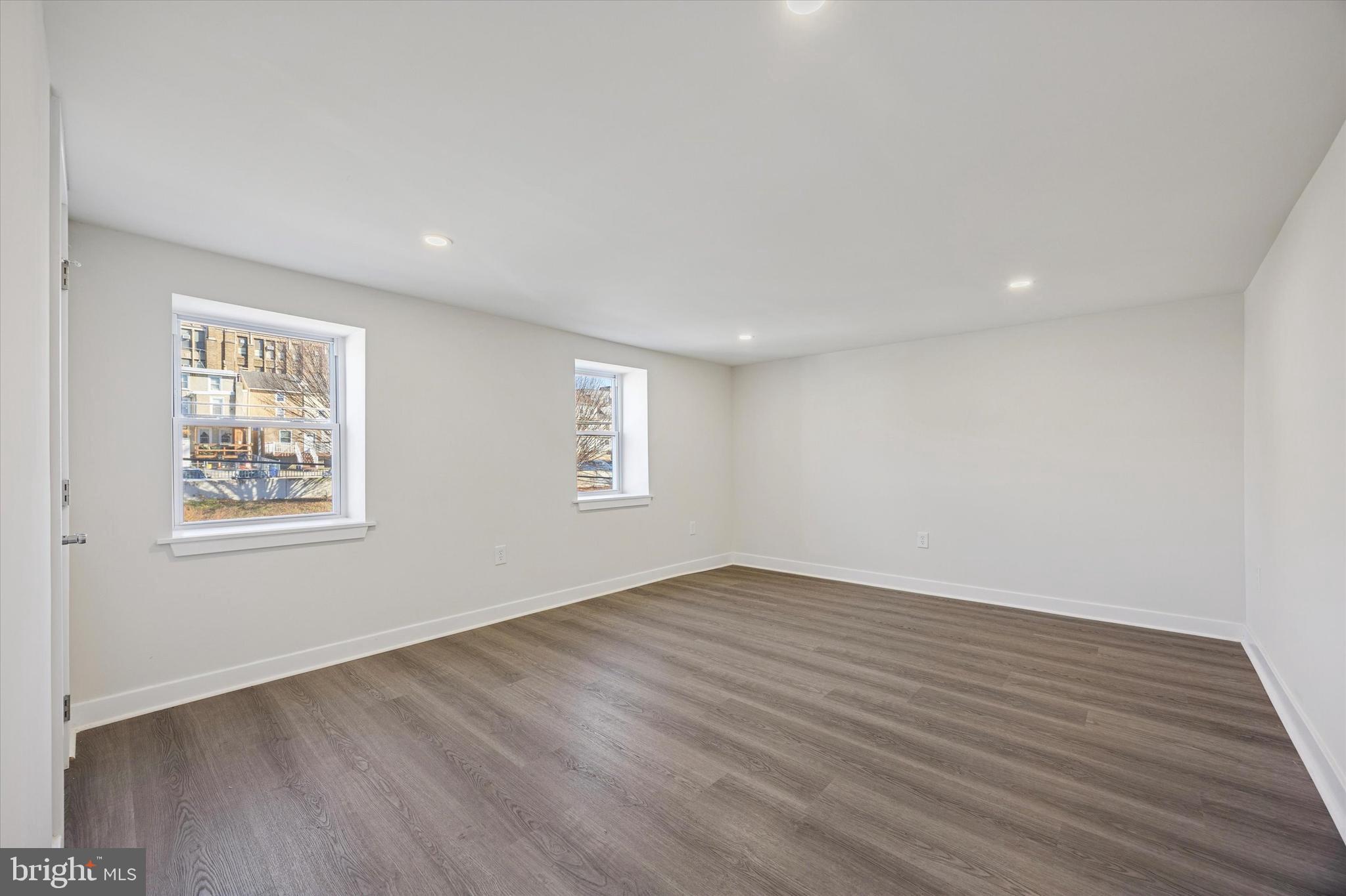 4666 Canton Street Philadelphia, PA 19127 - Photo 17 of 35 a view of an empty room with wooden floor and a window