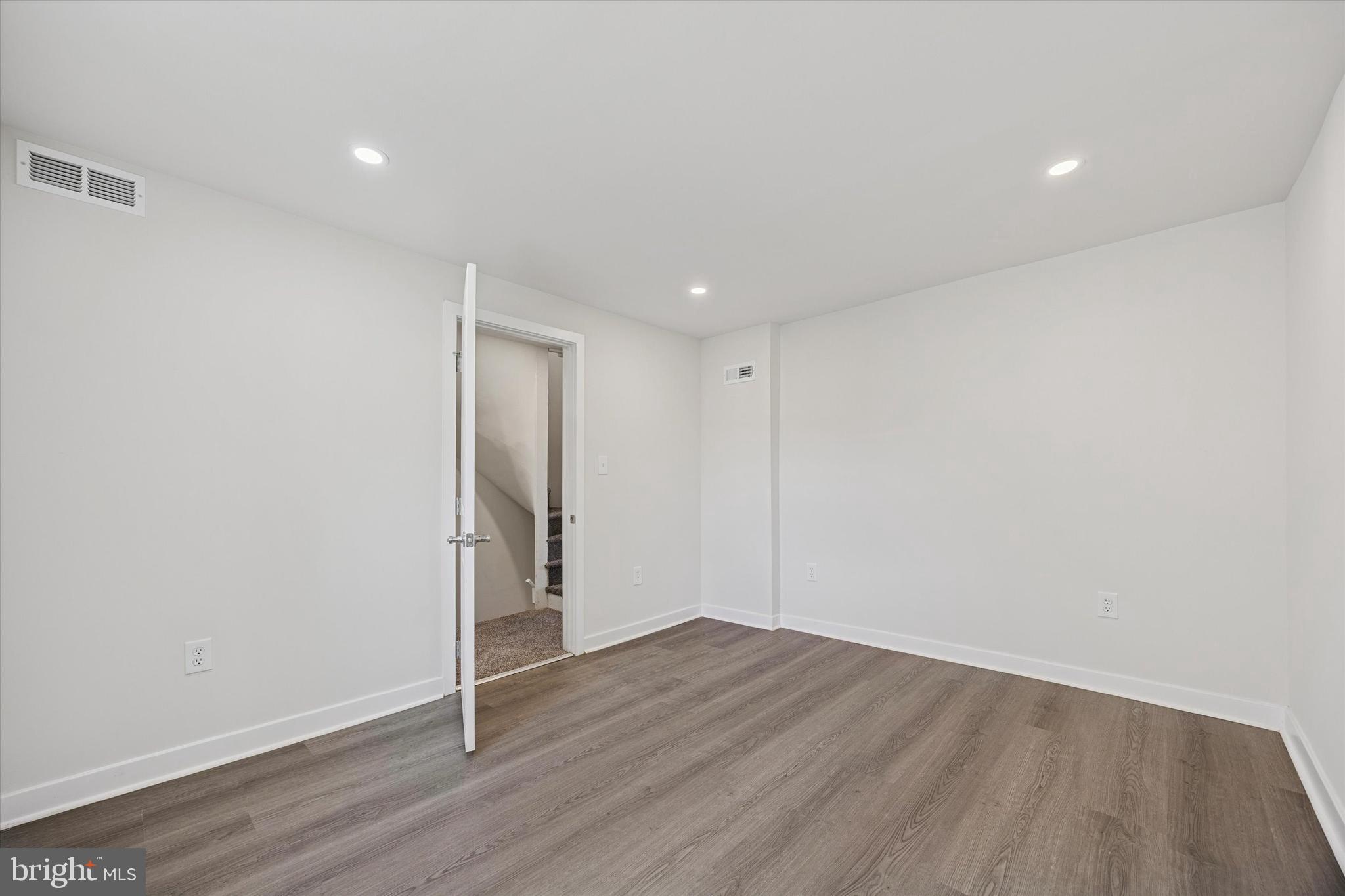 4666 Canton Street Philadelphia, PA 19127 - Photo 18 of 35 a view of an empty room with wooden floor and closet