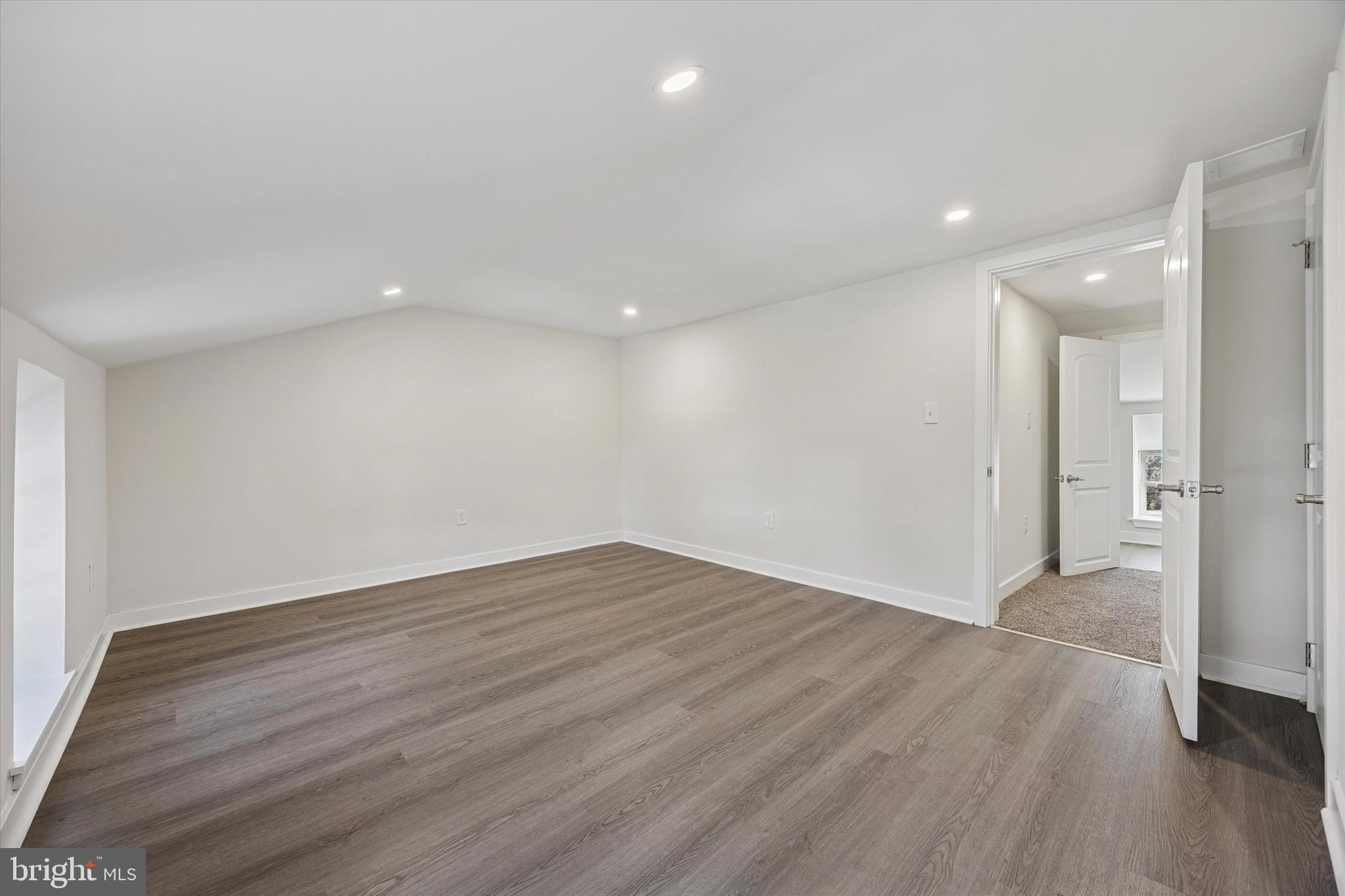 4666 Canton Street Philadelphia, PA 19127 - Photo 25 of 35 a view of an empty room with wooden floor