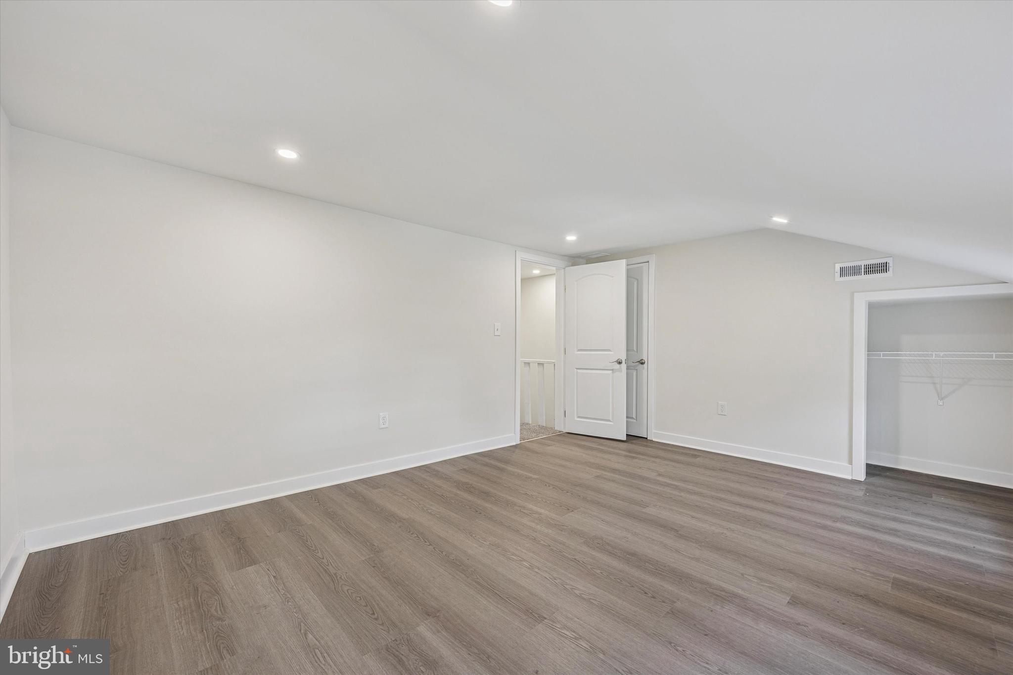4666 Canton Street Philadelphia, PA 19127 - Photo 26 of 35 a view of an empty room with wooden floor