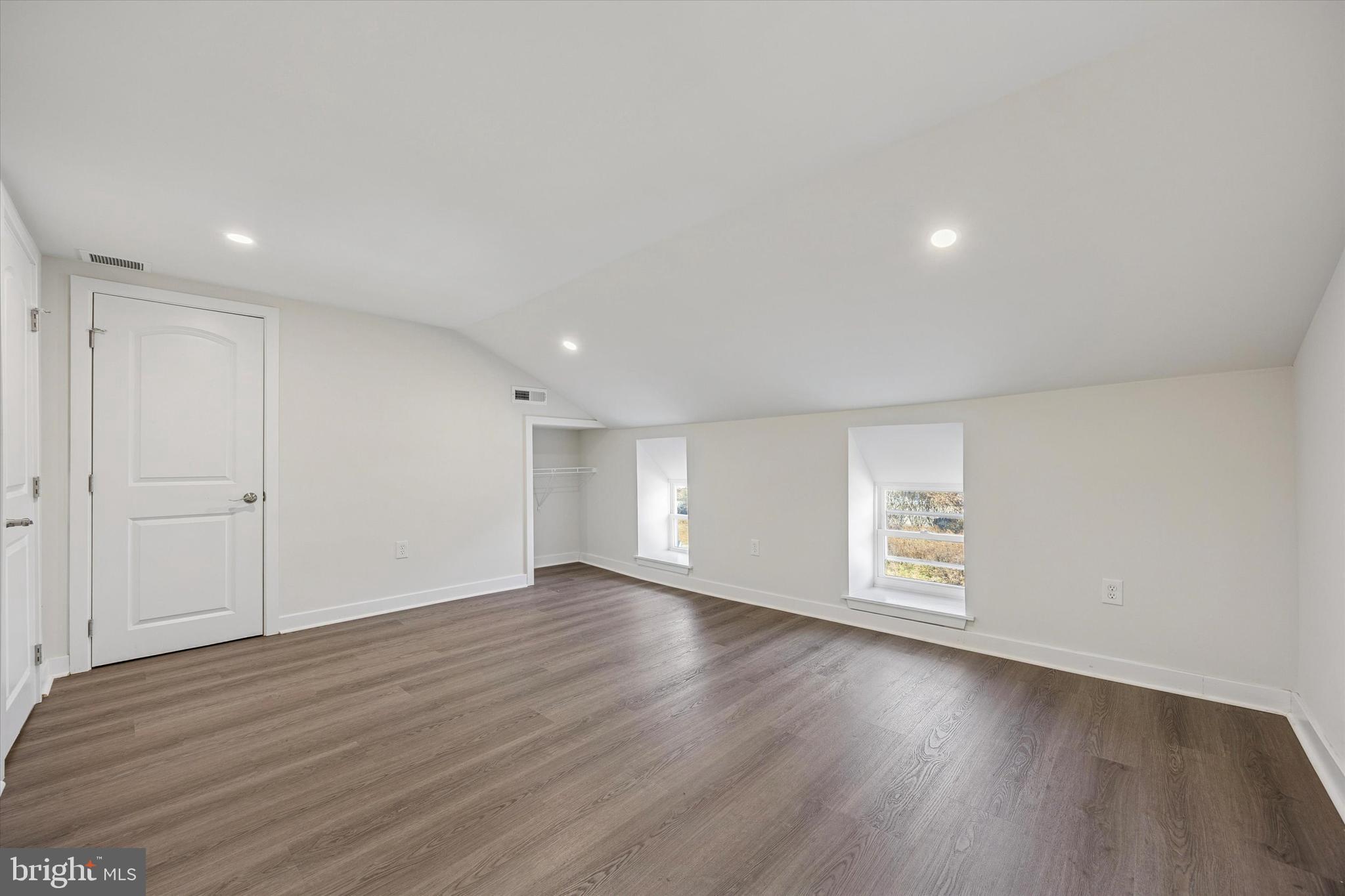 4666 Canton Street Philadelphia, PA 19127 - Photo 27 of 35 a view of an empty room with wooden floor and a window