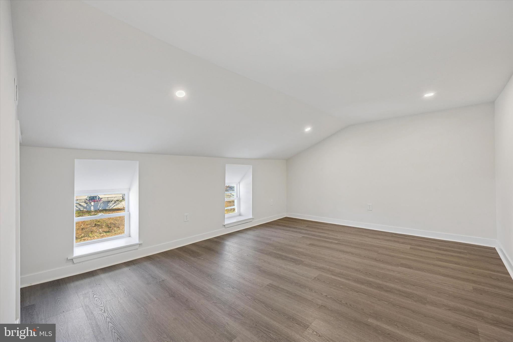 4666 Canton Street Philadelphia, PA 19127 - Photo 28 of 35 a view of an empty room with wooden floor and a window