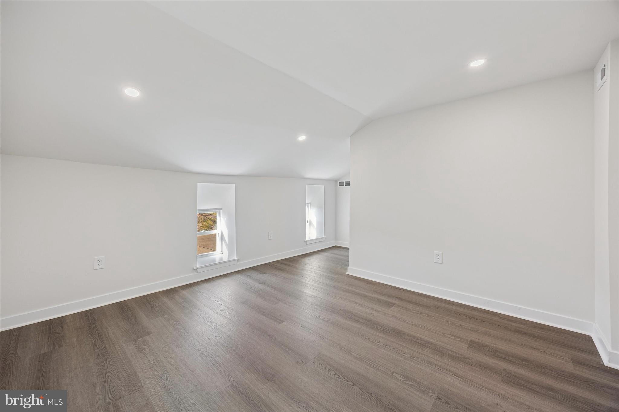4666 Canton Street Philadelphia, PA 19127 - Photo 30 of 35 a view of an empty room with wooden floor and a window