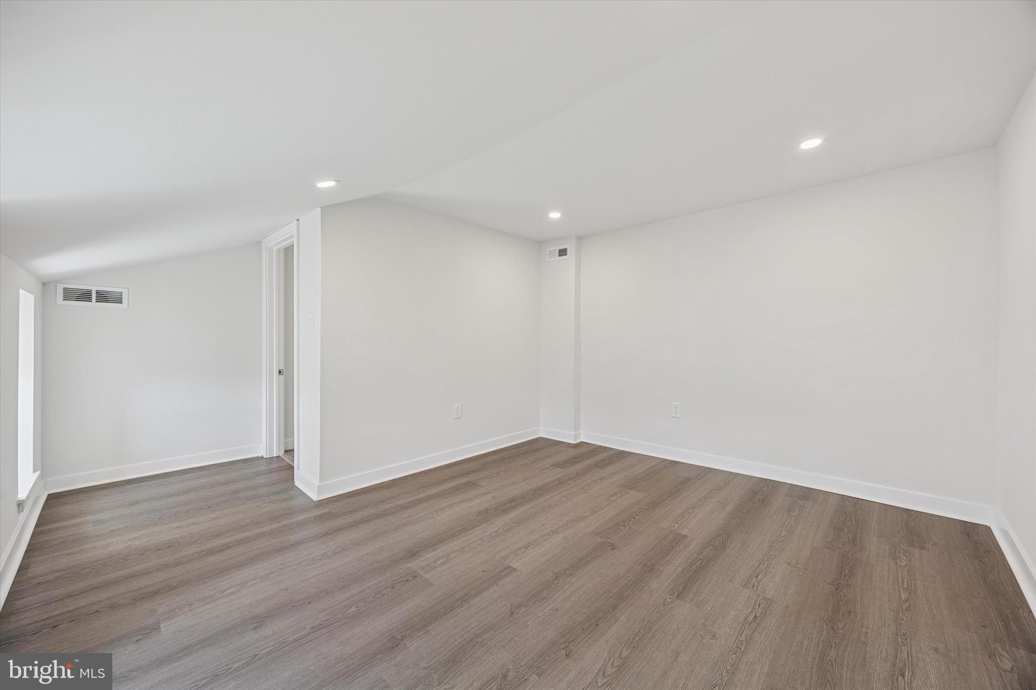 4666 Canton Street Philadelphia, PA 19127 - Photo 31 of 35 a view of an empty room with wooden floor