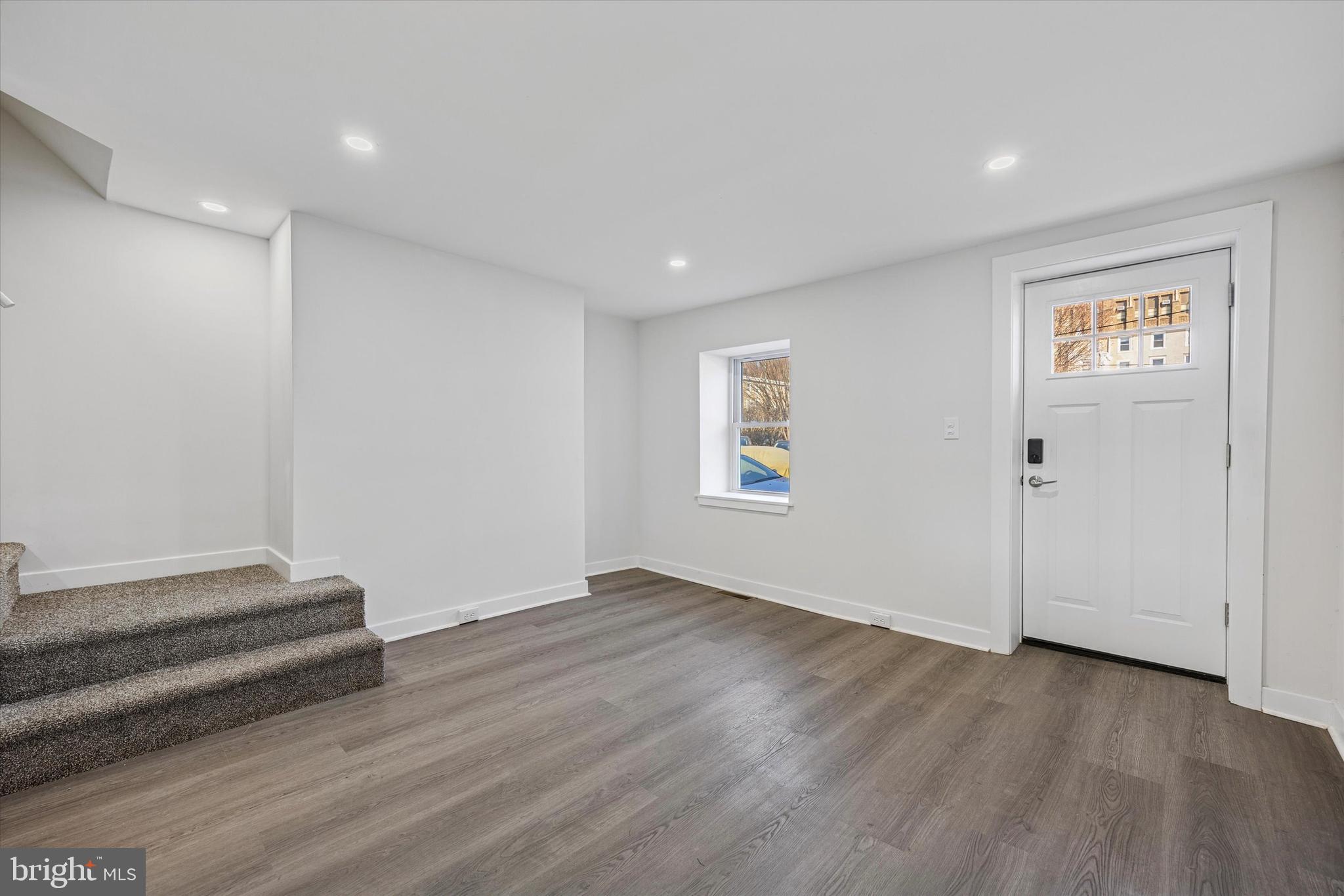 4666 Canton Street Philadelphia, PA 19127 - Photo 4 of 35 an empty room with wooden floor and windows