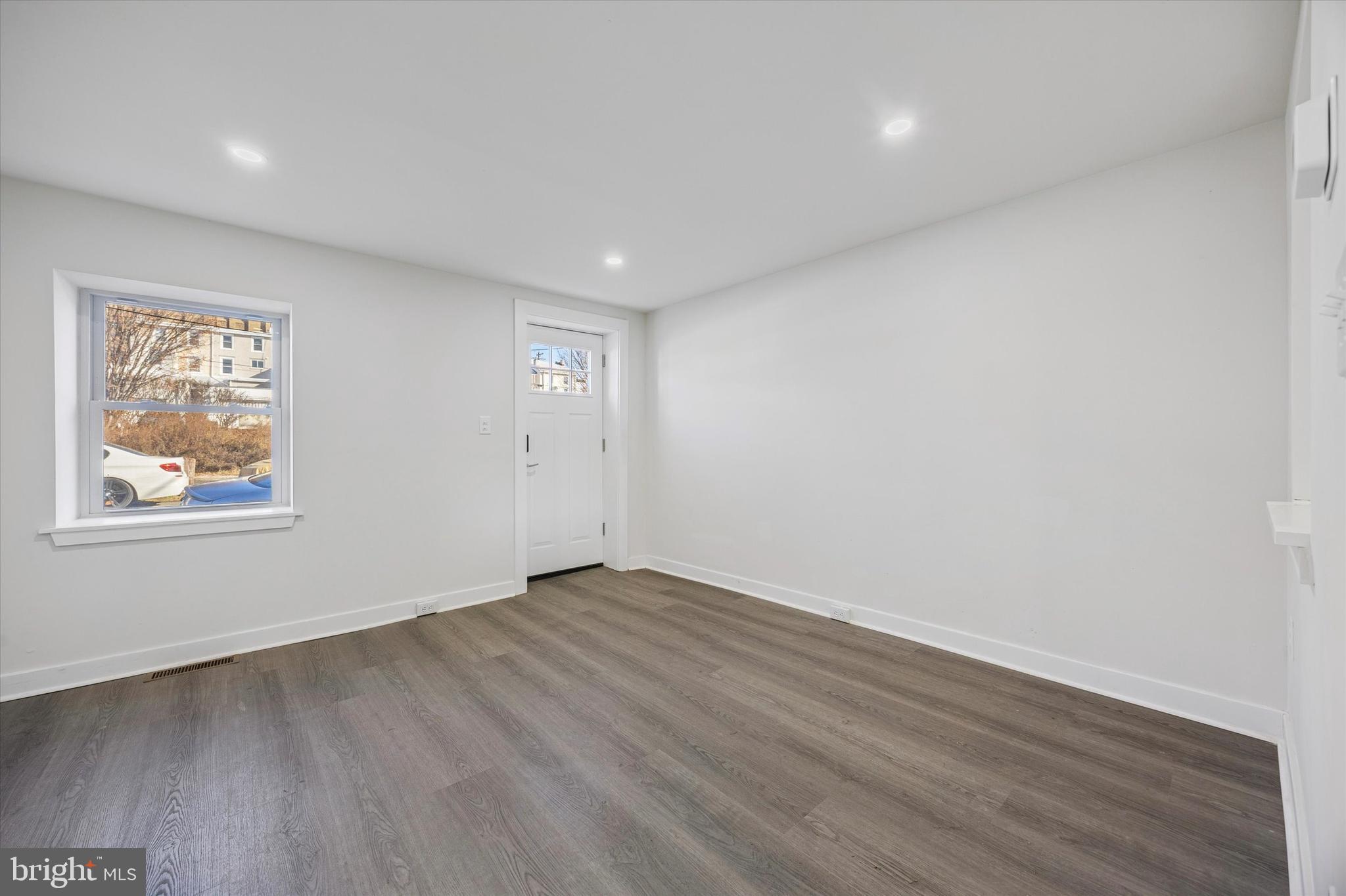 4666 Canton Street Philadelphia, PA 19127 - Photo 5 of 35 an empty room with wooden floor and windows