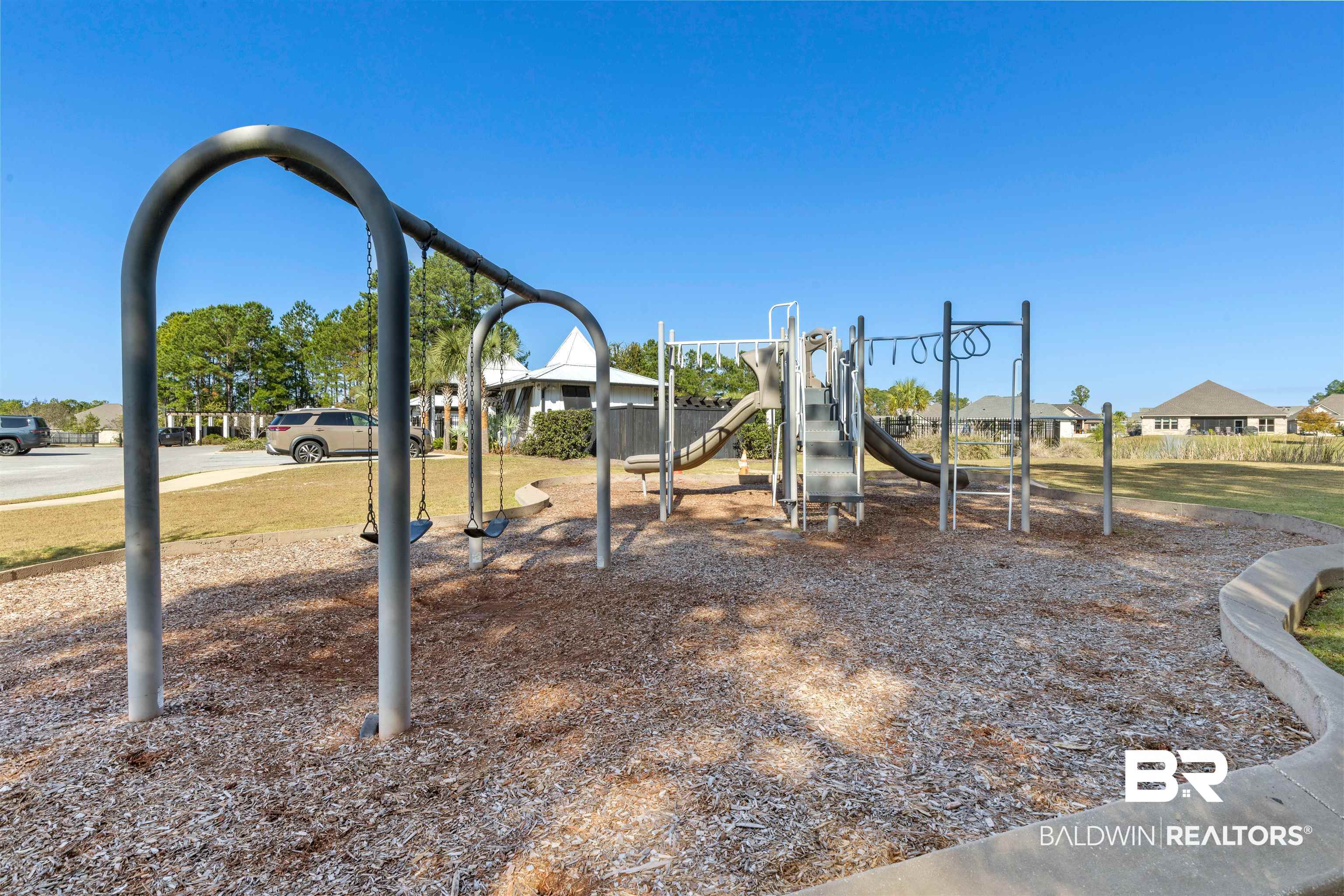 485 Shepard Street Gulf Shores, AL 36542 - Photo 49 of 53 Communal playground with a residential view