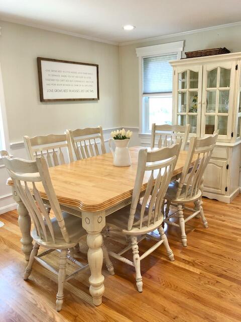 75 Tanbark Road Marstons Mills, MA 02648 - Photo 11 of 40 a view of a dining room with furniture and wooden floor