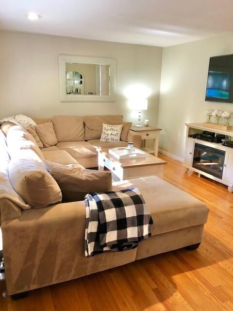 75 Tanbark Road Marstons Mills, MA 02648 - Photo 13 of 40 a living room with furniture and a flat screen tv