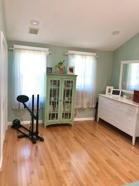 75 Tanbark Road Marstons Mills, MA 02648 - Photo 20 of 40 a living room with furniture and a wooden floor