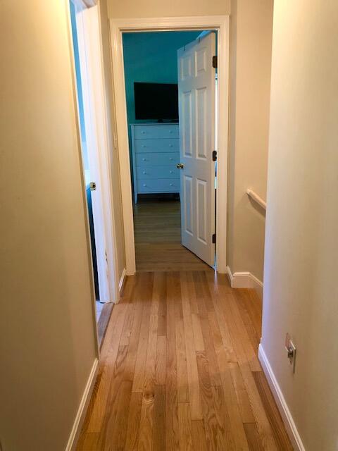 75 Tanbark Road Marstons Mills, MA 02648 - Photo 27 of 40 a view of a hallway with wooden floor and staircase