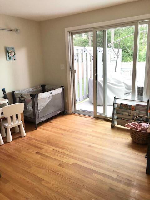 75 Tanbark Road Marstons Mills, MA 02648 - Photo 29 of 40 a bedroom with furniture and a large window