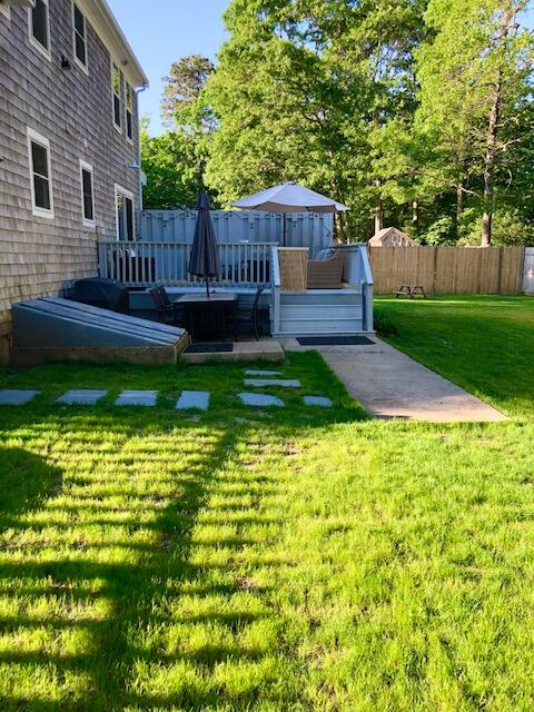 75 Tanbark Road Marstons Mills, MA 02648 - Photo 34 of 40 a view of a house with backyard and sitting area