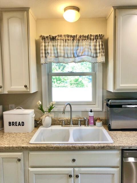 75 Tanbark Road Marstons Mills, MA 02648 - Photo 4 of 40 a bathroom with a granite countertop sink and a window