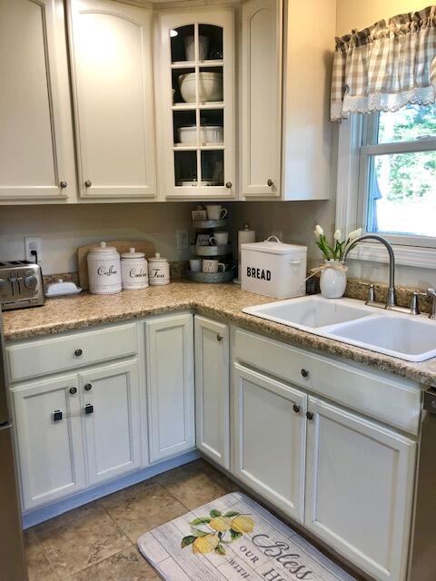 75 Tanbark Road Marstons Mills, MA 02648 - Photo 5 of 40 a kitchen with stainless steel appliances granite countertop a sink dishwasher stove and cabinets