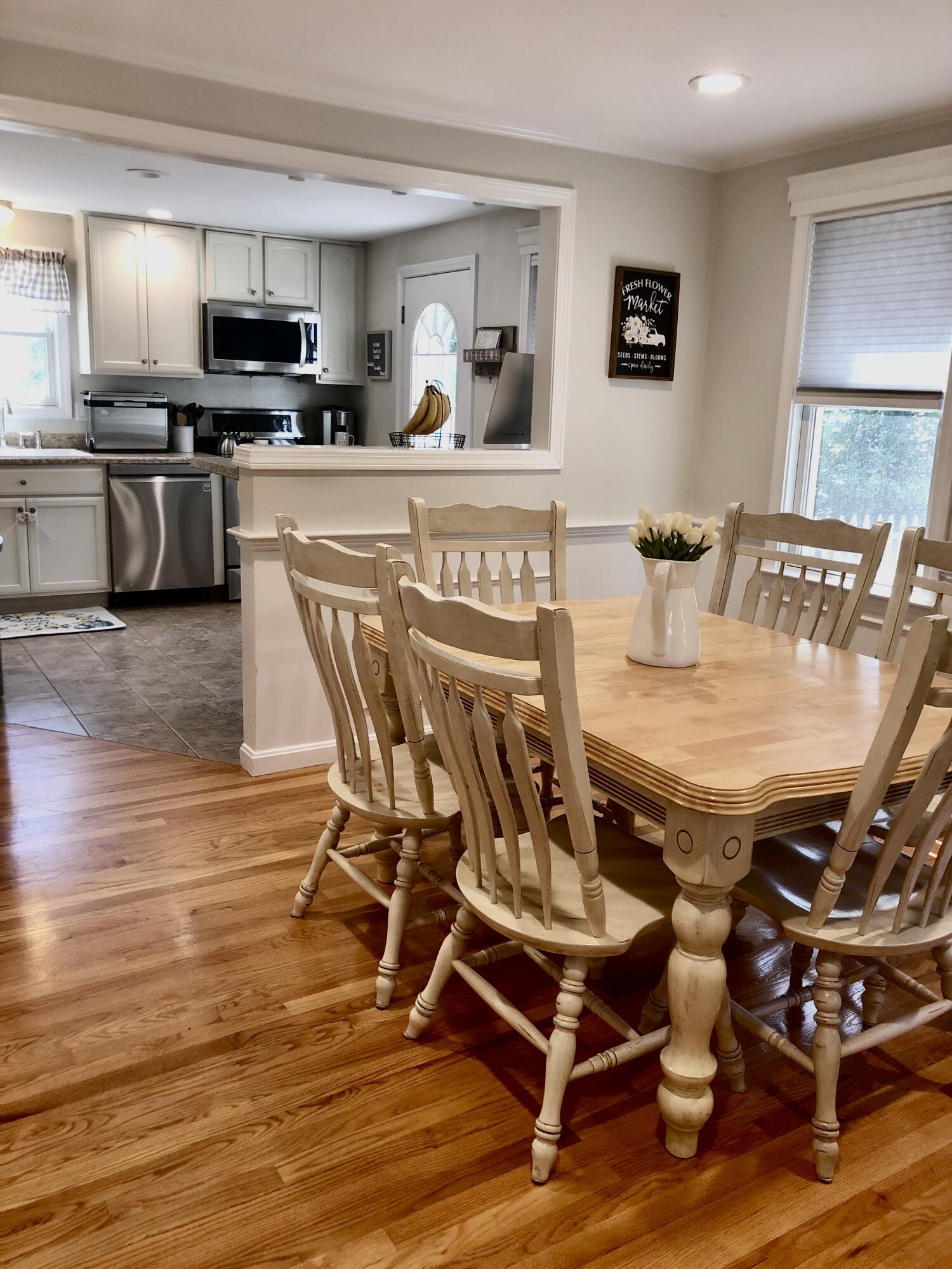 75 Tanbark Road Marstons Mills, MA 02648 - Photo 10 of 40 a view of a dining room with furniture and wooden floor