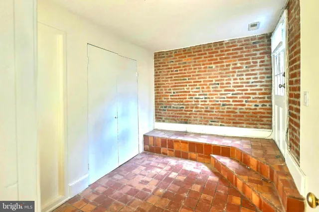 a view of a bathroom with a bathtub