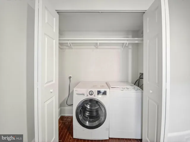 a utility room with dryer and washer
