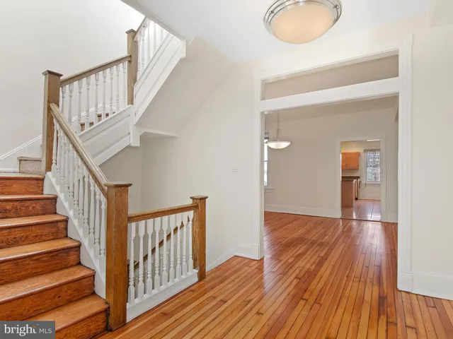 a view of entryway with wooden floor