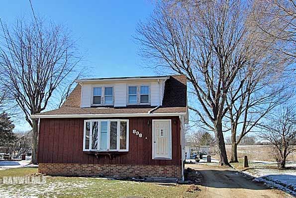 898 North Henderson Road Freeport, IL 61032 - Photo 19 of 19 a front view of a house with a yard