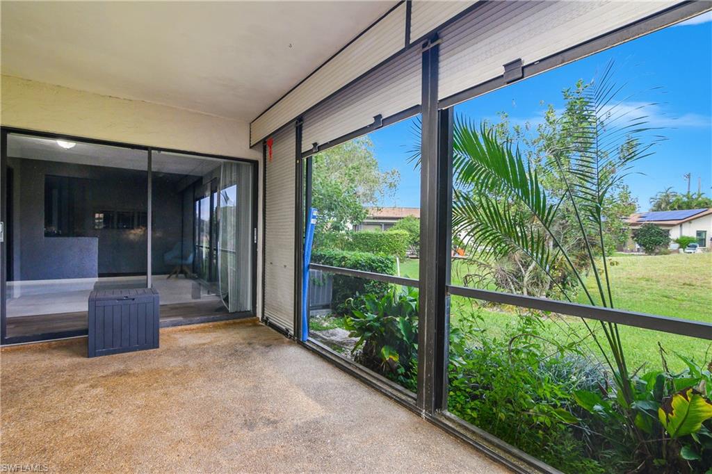 191 Round Key Circle, Unit D2 Naples, FL 34112 - Photo 14 of 24 a view of a porch