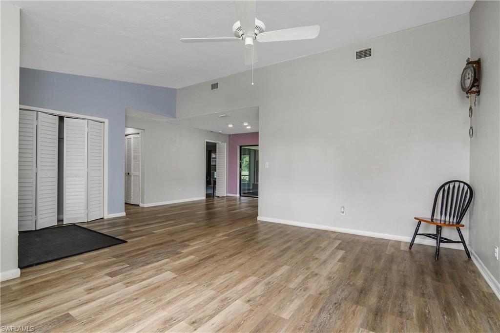 191 Round Key Circle, Unit D2 Naples, FL 34112 - Photo 6 of 24 a view of livingroom with furniture and wooden floor