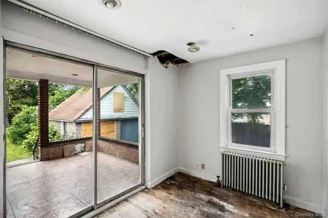 an empty room with windows