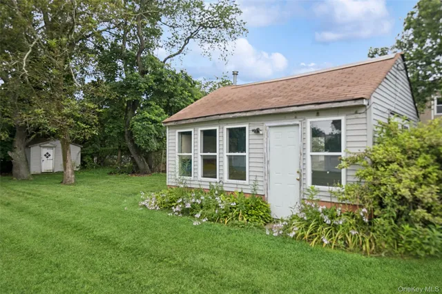 a house view with a garden space