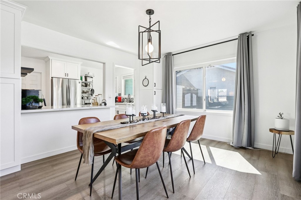 1448 Lemon Avenue Long Beach, CA 90813 - Photo 6 of 16 a view of a dining room with furniture window and wooden floor