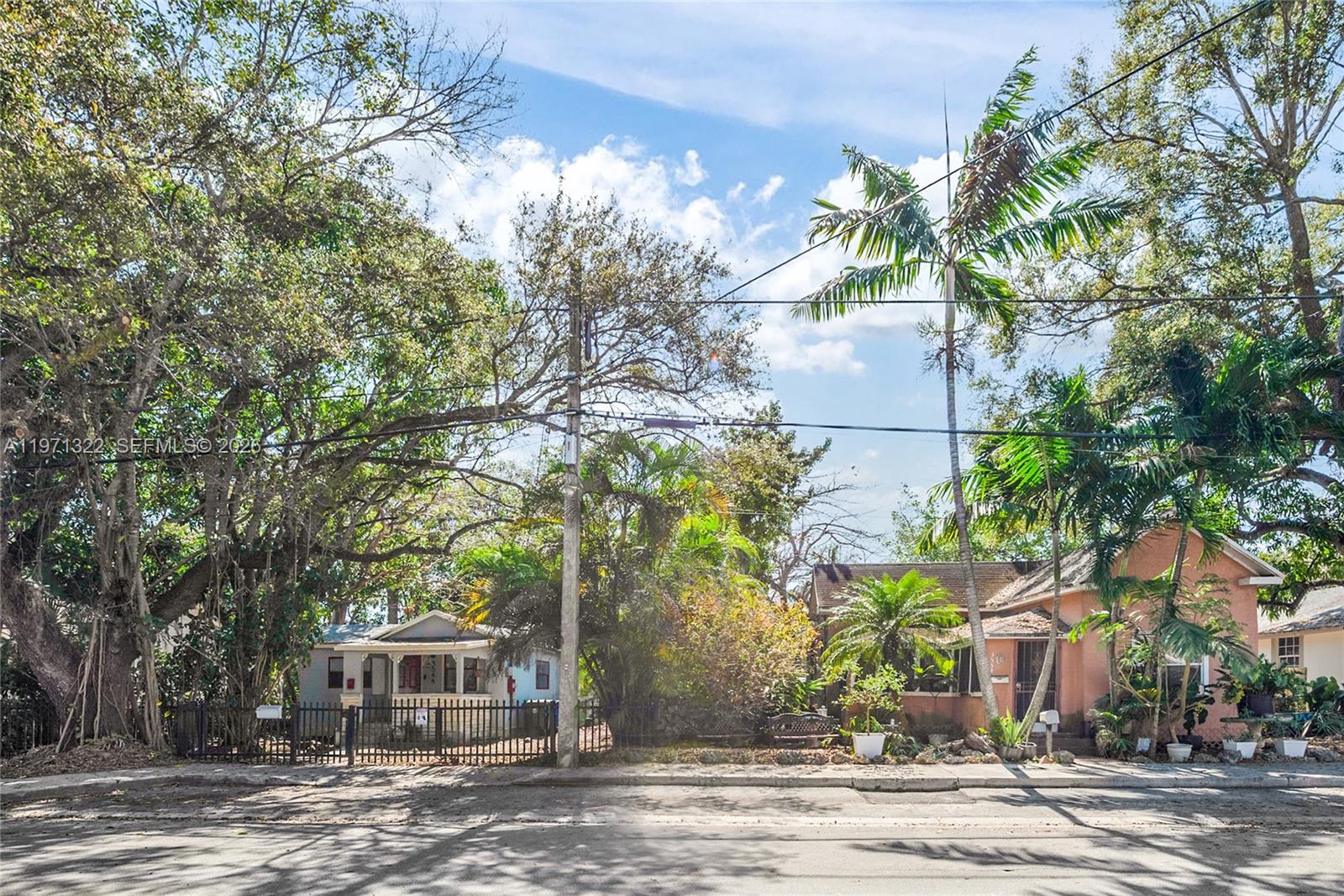 3544 William Avenue Miami, FL 33133 - Photo 5 of 13 a front view of a house with a yard