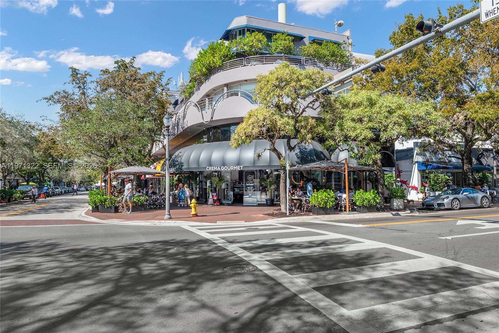 3544 William Avenue Miami, FL 33133 - Photo 10 of 13 a front view of a building with trees
