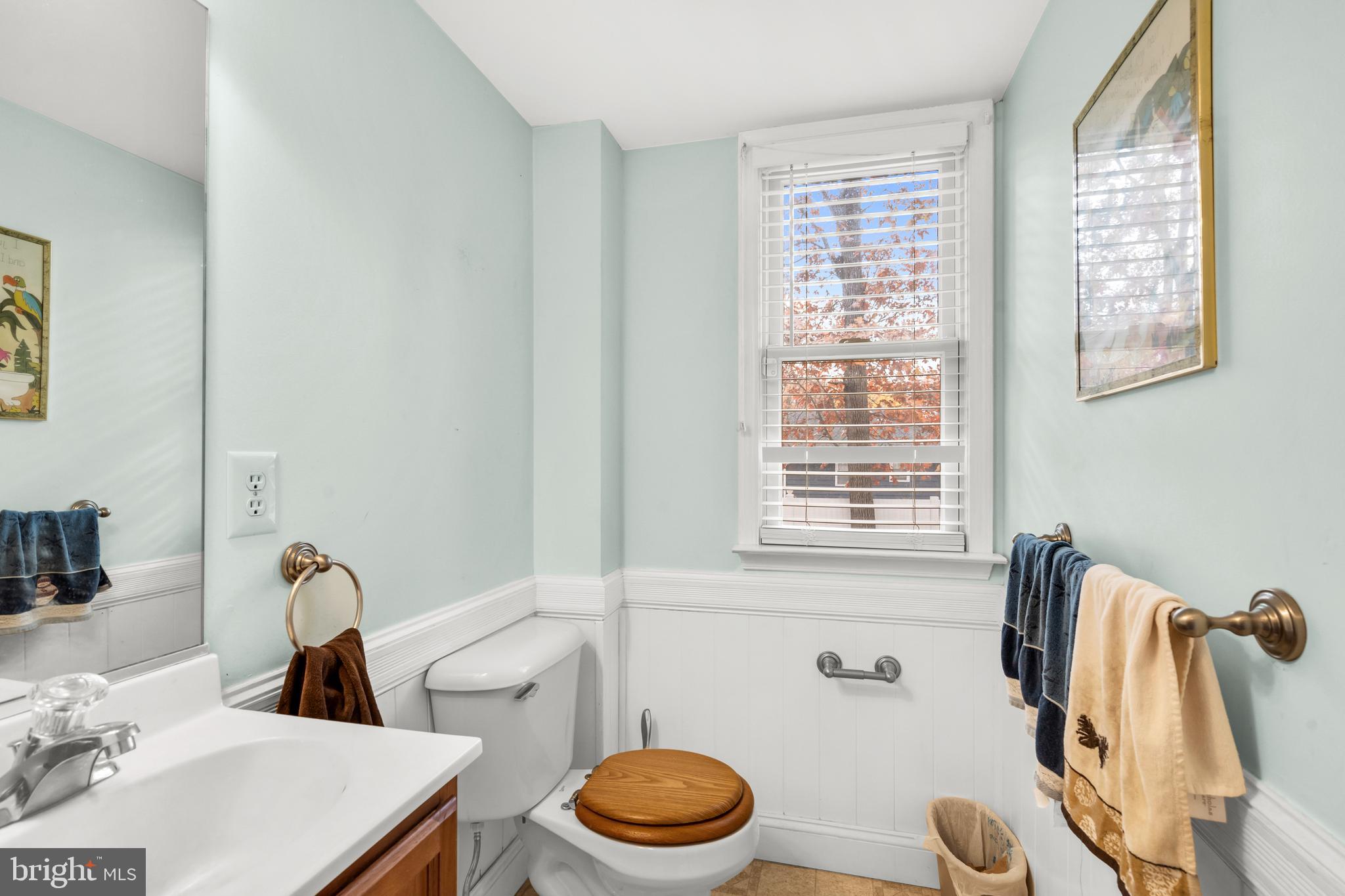470 Wilson Avenue Lindenwold, NJ 08021 - Photo 11 of 38 a bathroom with a sink a toilet and a window
