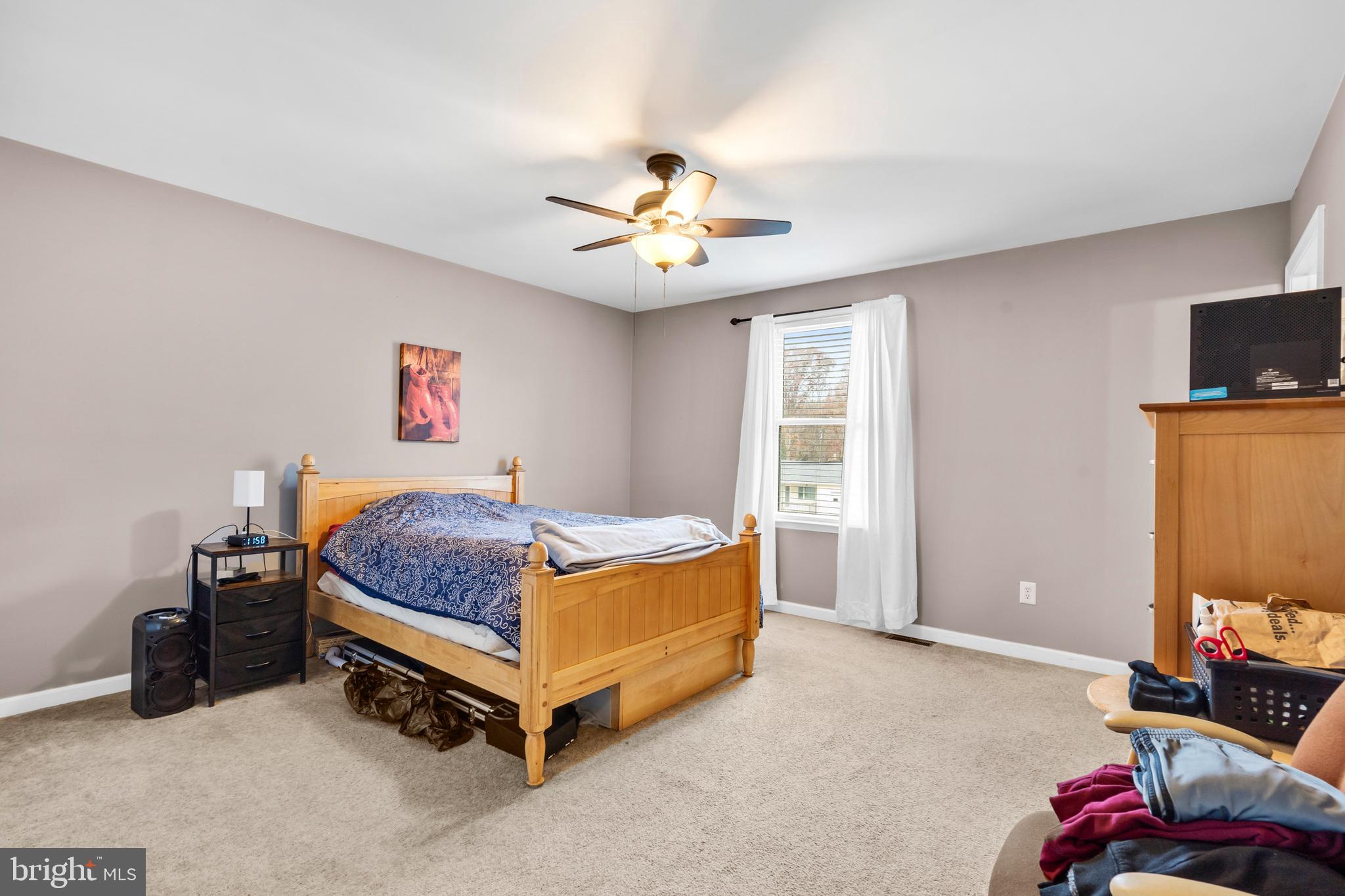 470 Wilson Avenue Lindenwold, NJ 08021 - Photo 12 of 38 a bedroom with a bed and a tv