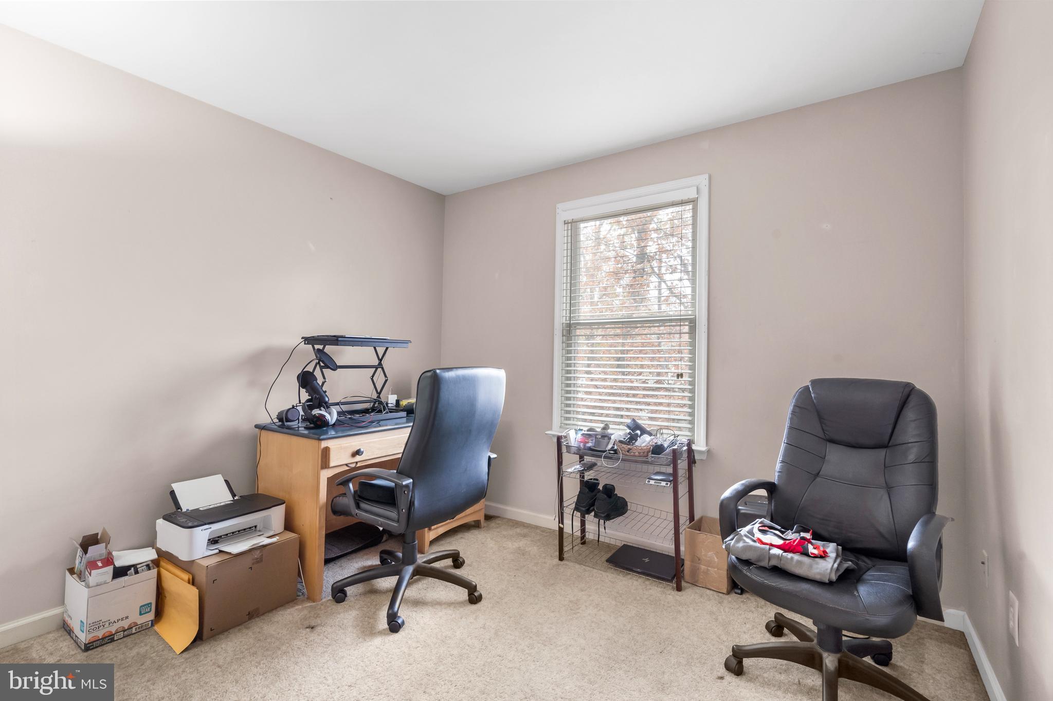 470 Wilson Avenue Lindenwold, NJ 08021 - Photo 16 of 38 a view of a workspace with furniture and a window